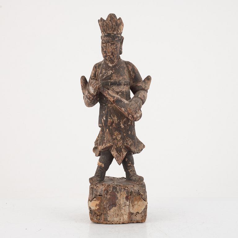 A Chinese wooden gardian figure, Qing dynasty.