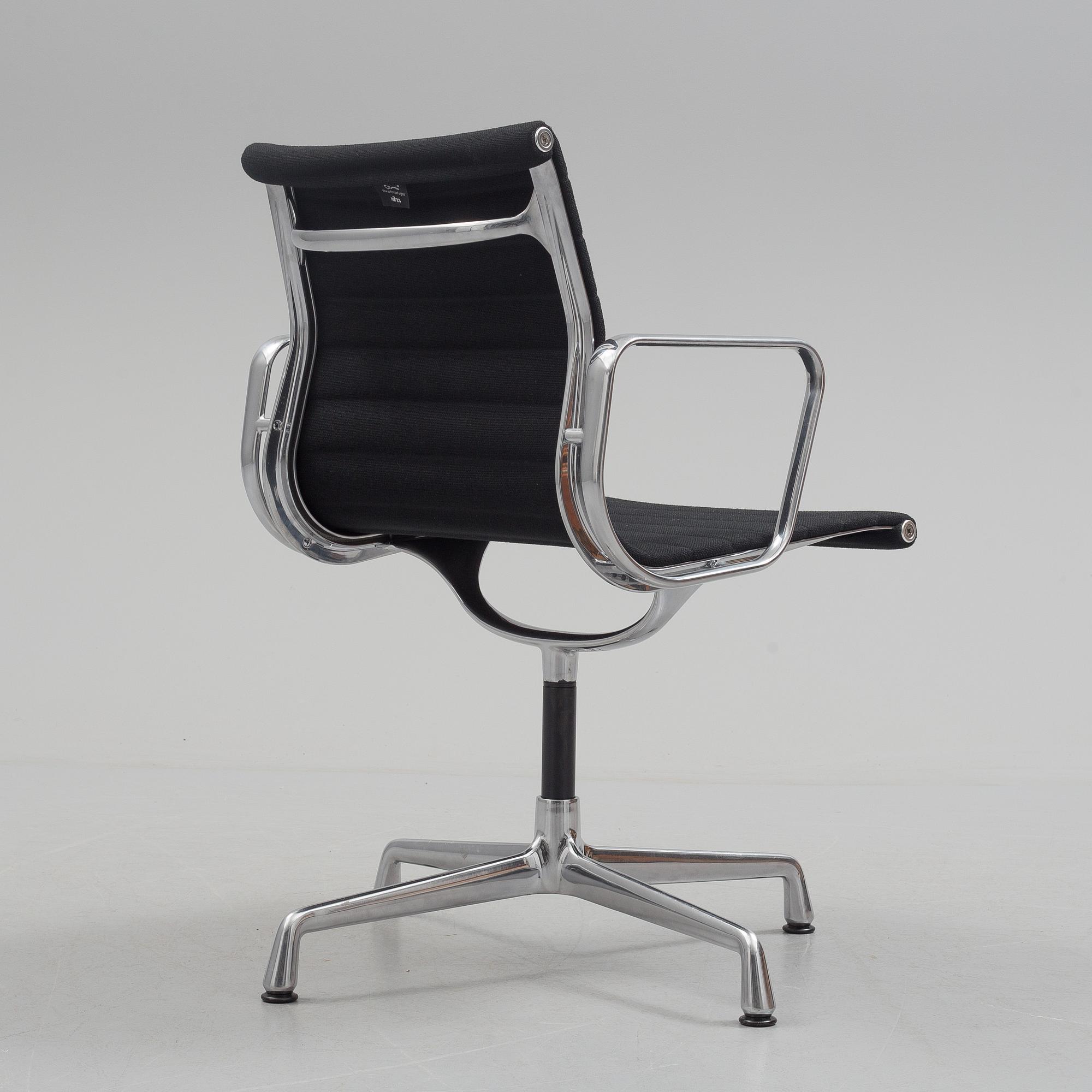 A 'EA 104 Swivel' armchair by Charles & Ray Eames, Vitra, 2016.