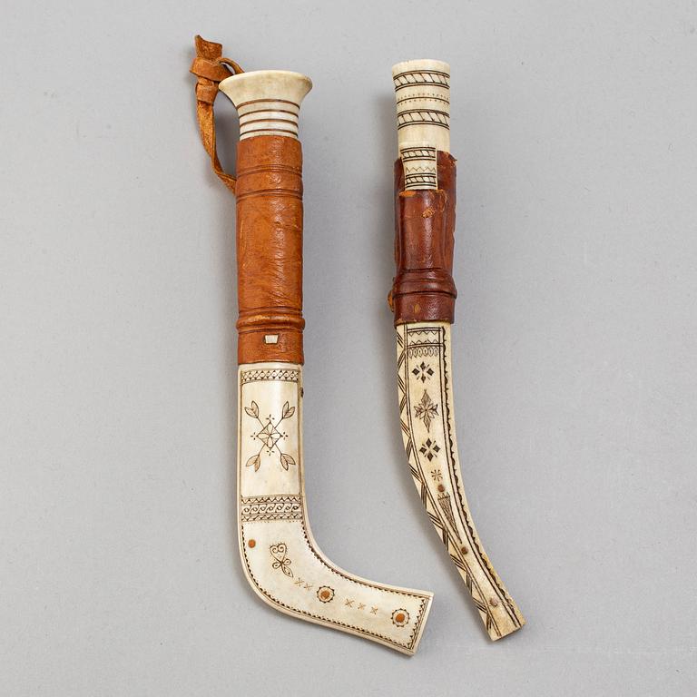 Two Sami reindeer horn knives, one signed JF.