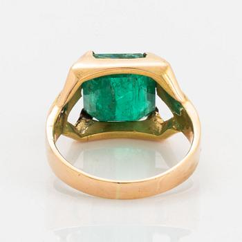 Emerald-cut emerald.
