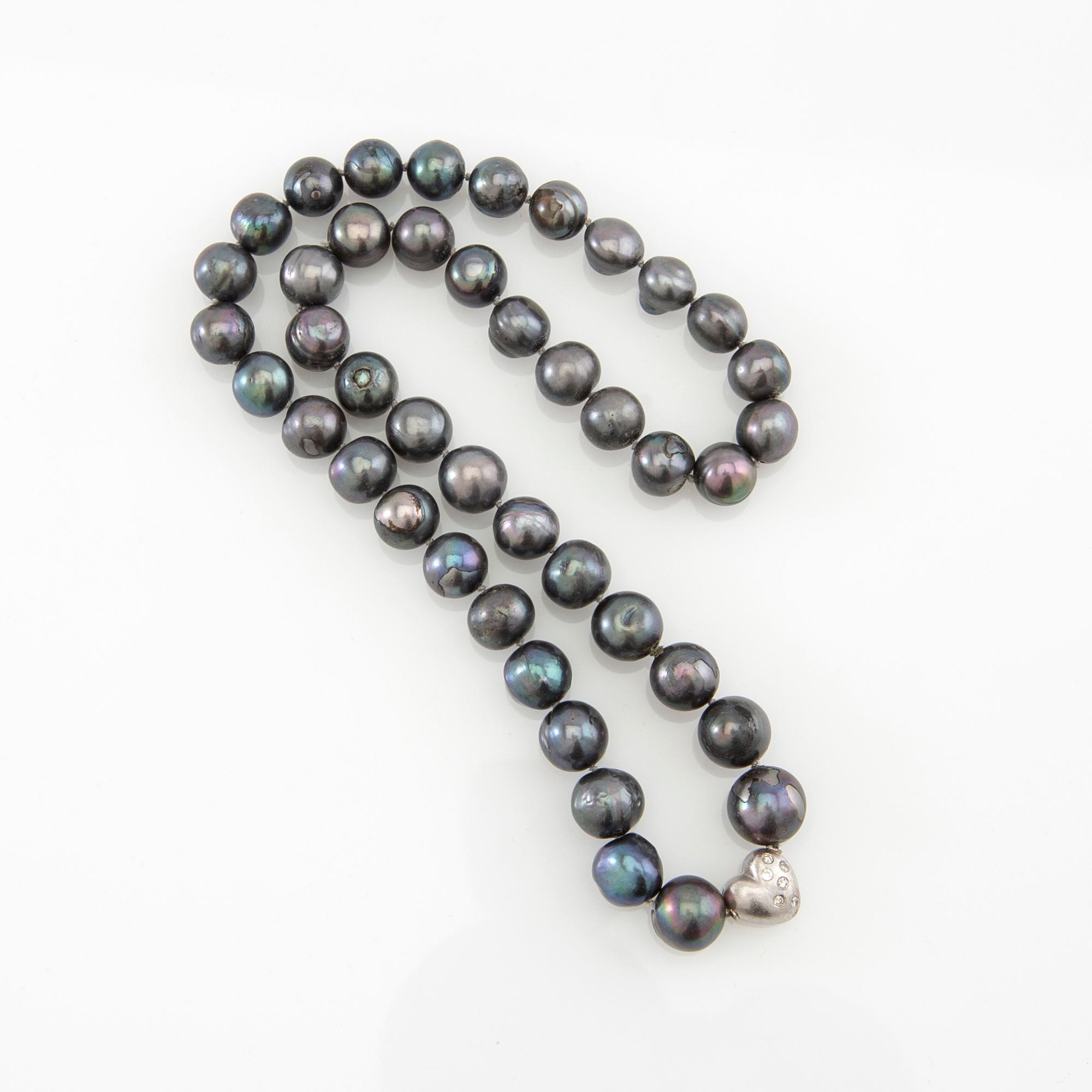 Ole Lynggaard, Lock 18K white gold with accompanying necklace of cultured pearls.