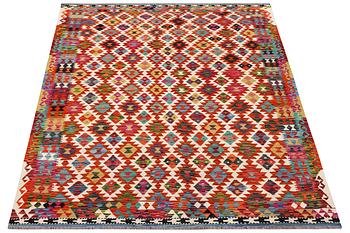 A Kilim carpet, c. 250 x 179 cm.