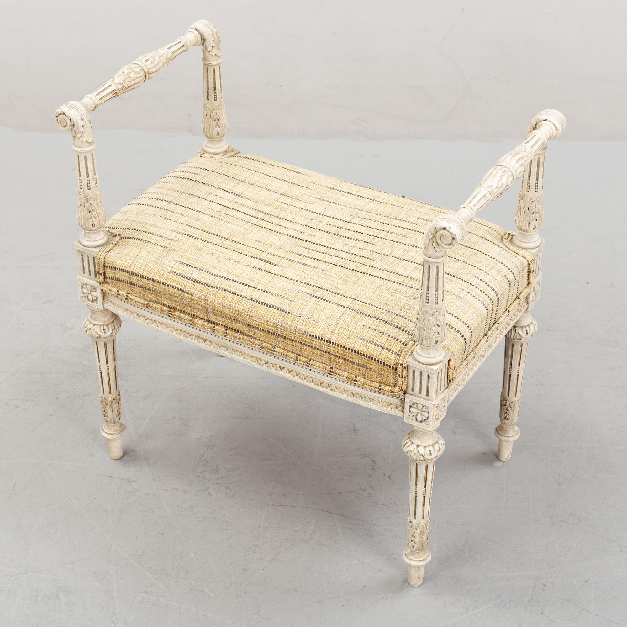 An early 20th Century Louis XVI style banquet stool.