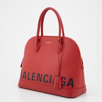 Balenciaga, A red grain calf skin 'Ville top handle graffiti bag'.