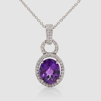 1268. A 2.70 ct amethyst and brilliant-cut diamond pendant. Total carat weight of diamonds circa 0.42 ct. Chain included.