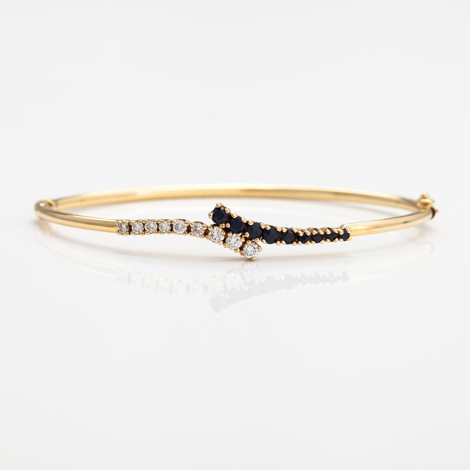 Armband, 14K guld, safirer och diamanter ca. 0.44 ct tot.