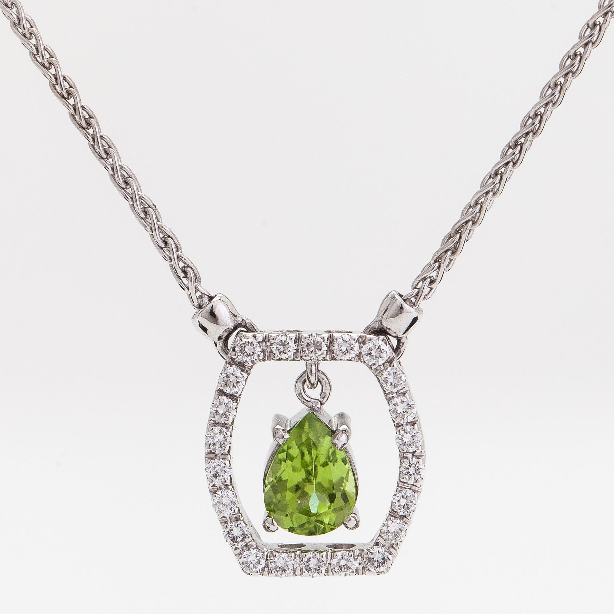 Halsband, 18K vitguld med droppformad peridot och diamanter totalt ca 0.44 ct.