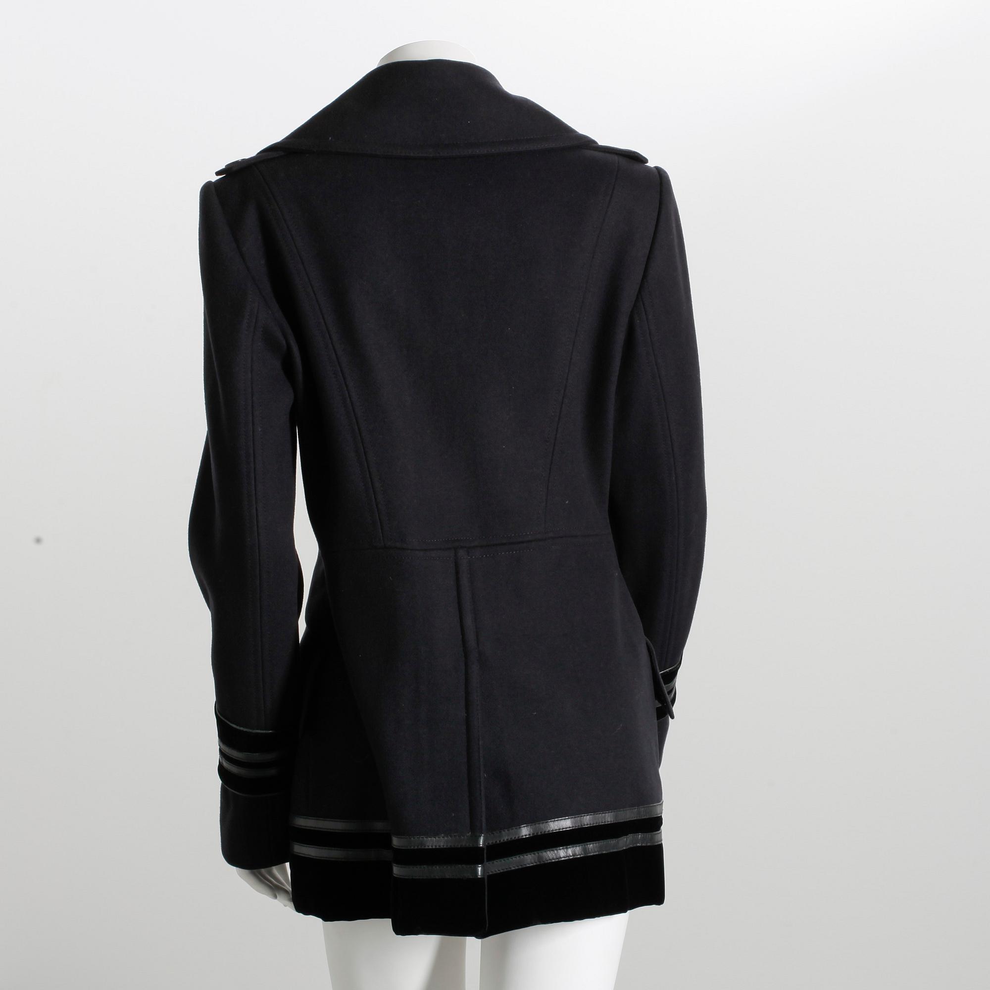 GUCCI, a black wool coat.