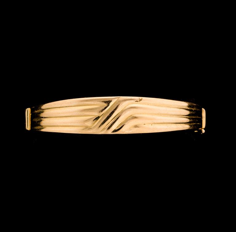 ARMRING, 18K guld. Vikt ca 17 gram.