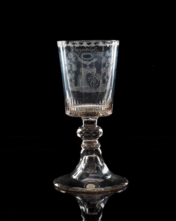 An engraved wine goblet, England, early 19th Century.