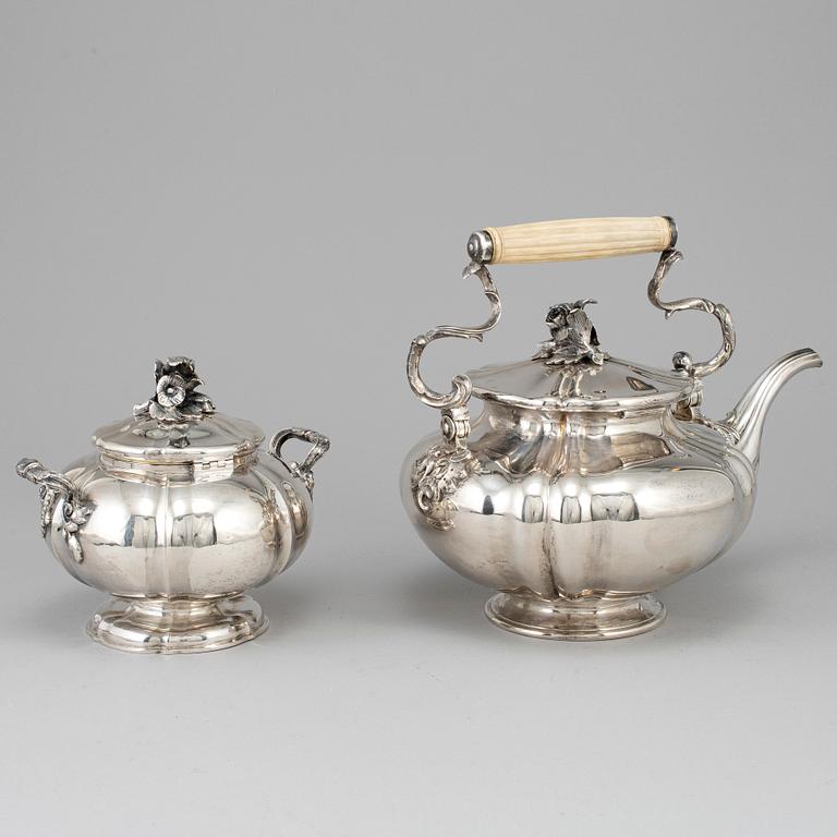 A silver teapot and sugar bowl, maker's mark of Carl Bojanowski, St. Petersburg 1851-57.