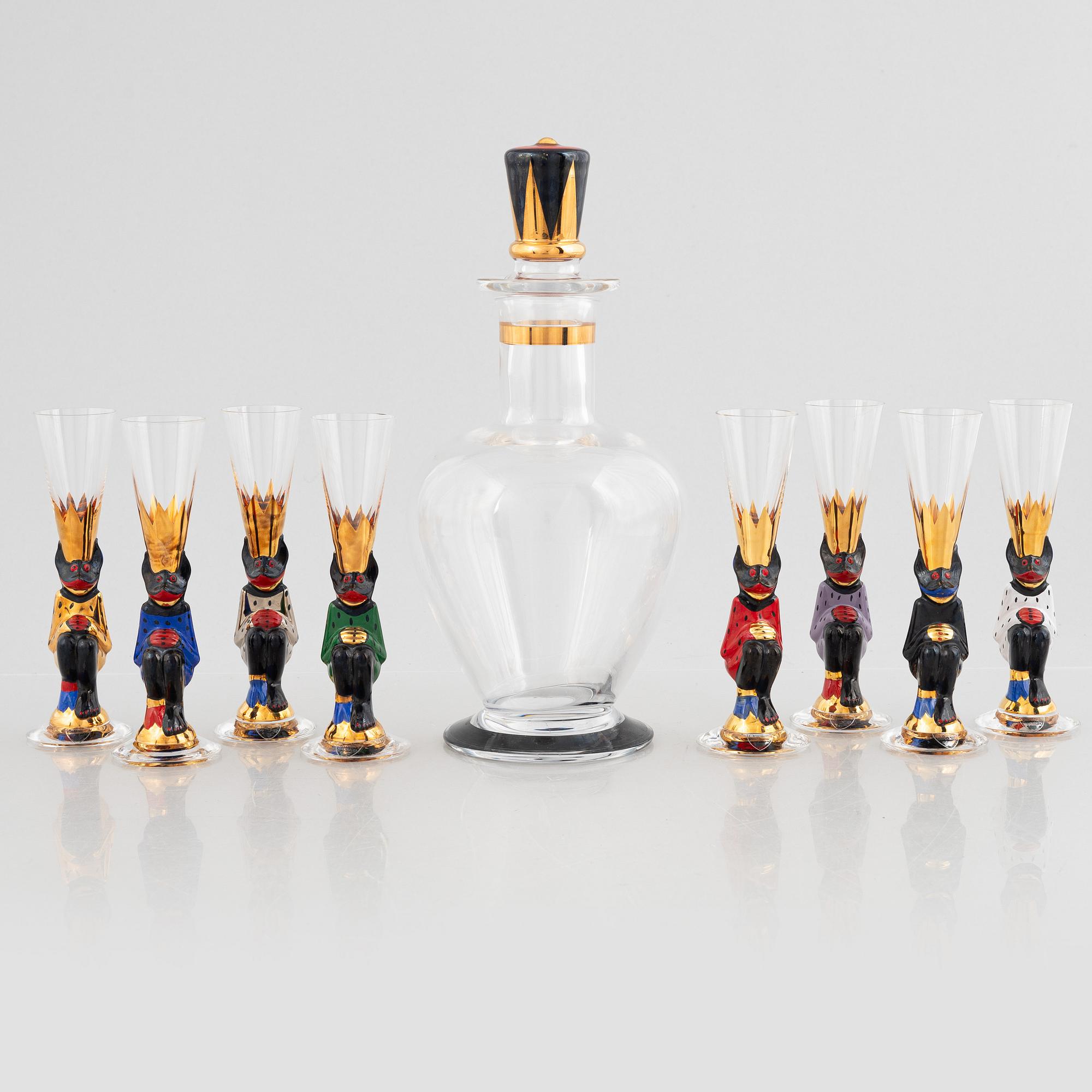 Gunnar Cyrén, eight 'Nobel' schnapps glass and a decanter with stopper, Orrefors, Sweden.