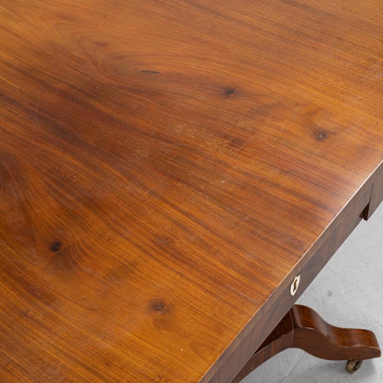 A Swedish Empire mahogany center table, early 19th century.