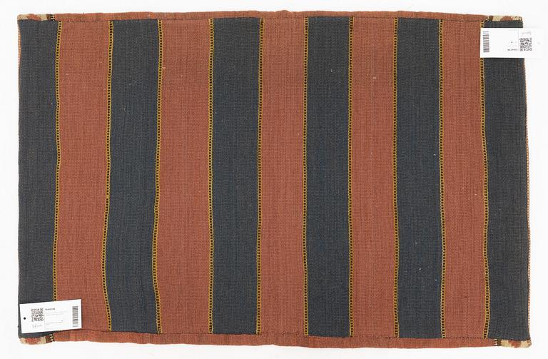 A carriage cushion, flat weave, c 87 x 58 cm, Skåne, circa 1900.