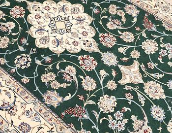 A part silk Nain rug, so-called 9LAA, approx. 257 x 161 cm.