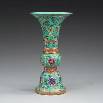 A famille rose against turquoise ground vase, 20th Century, with Qianlong mark.