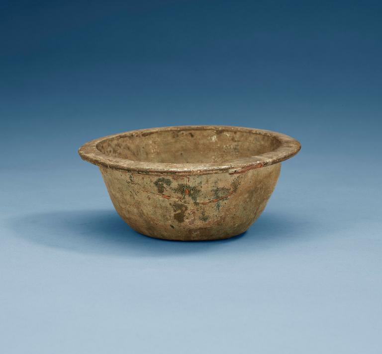 A green glazed bowl, Han dynasty (206 BC – 220 AD).
