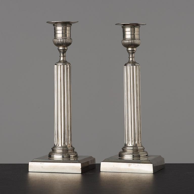 A pair of Gustavian white metal candlesticks by Isak Gråsten (1770-1821), Wedevågs Bruk.