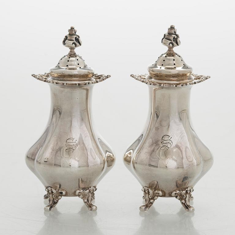 Black Starr & Frost, a pair of sterling silver shakers and sugar bowls, USA around 1900, Gorham pair of sterling spoons.