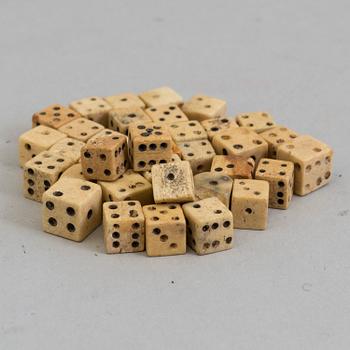 36 MINIATURE BONE DICE, 19th century.