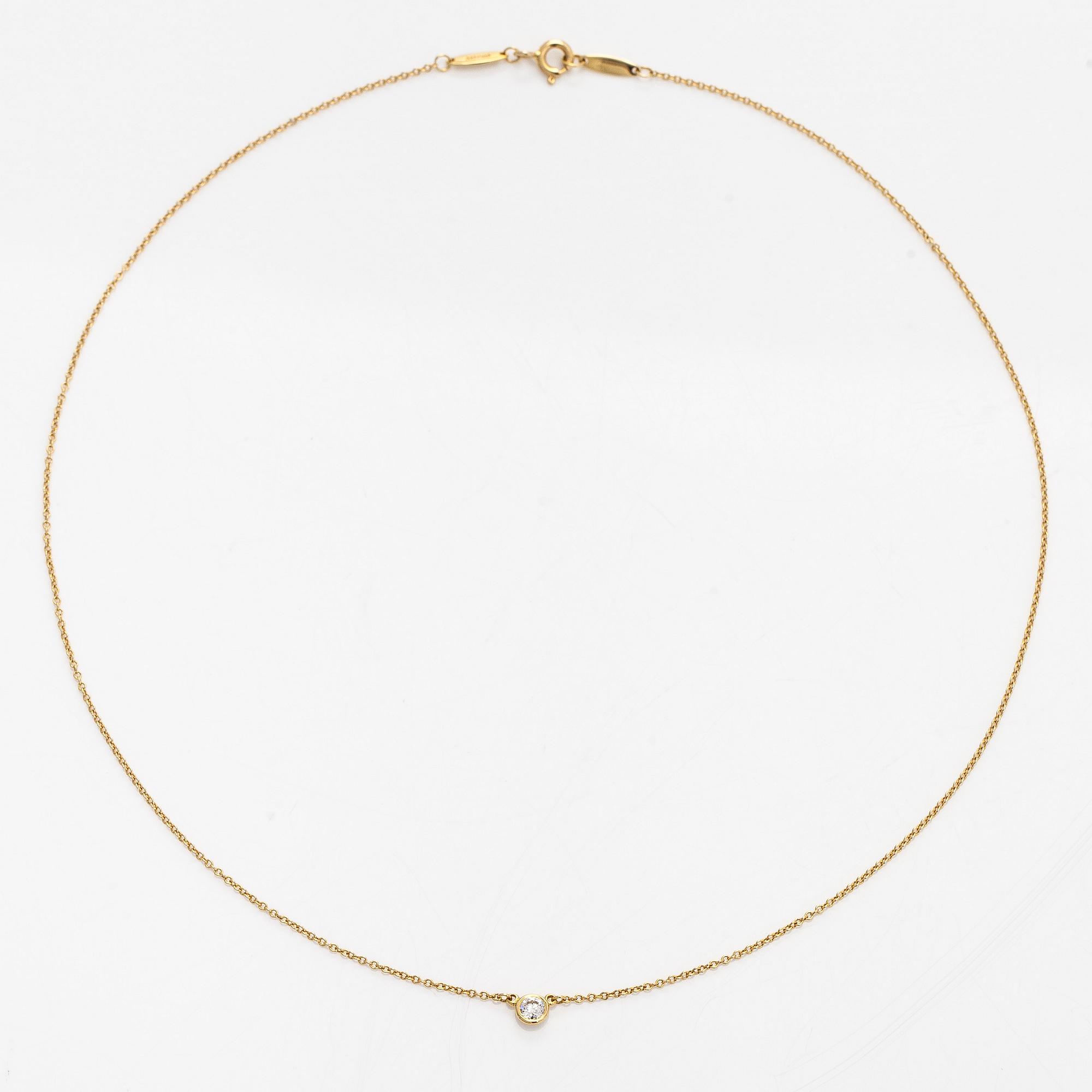 Tiffany & Co, Elsa Peretti, an 18K gold 'Diamonds by the Yard' necklace with a brilliant-cut diamond.