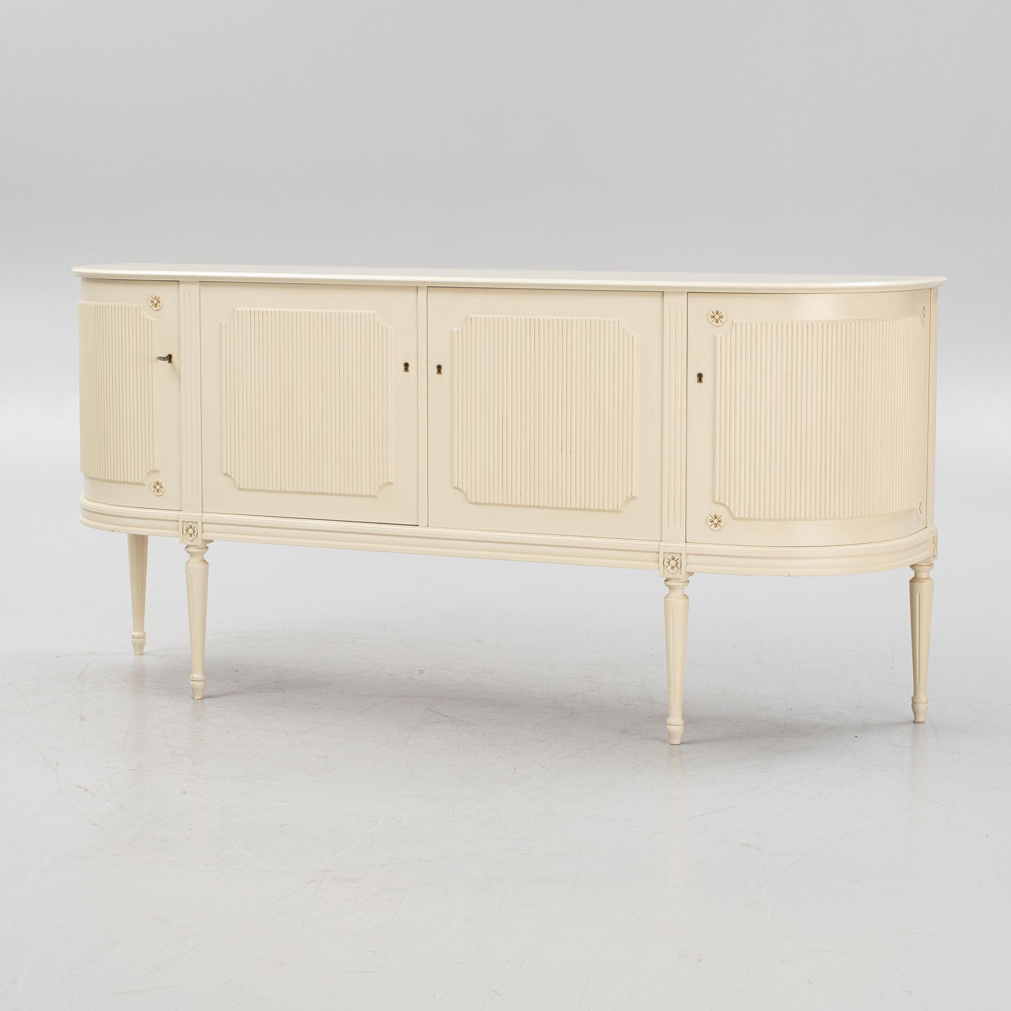 A gustavian style sideboard, mid 20th century.