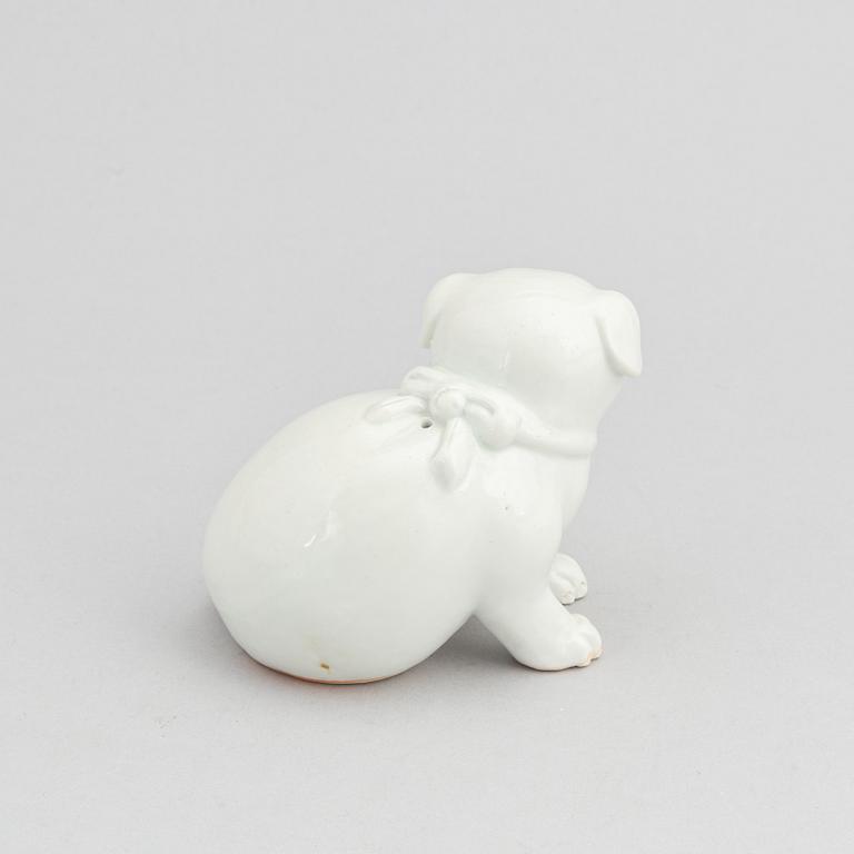 A Japanese Hirado ware figure or water dropper in the shape of a dog, 20th Century or older.