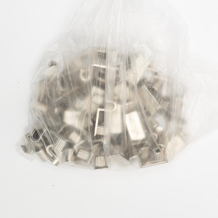 A 'String' shelving system by Nils Strinning, with three sides and 12 shelves.