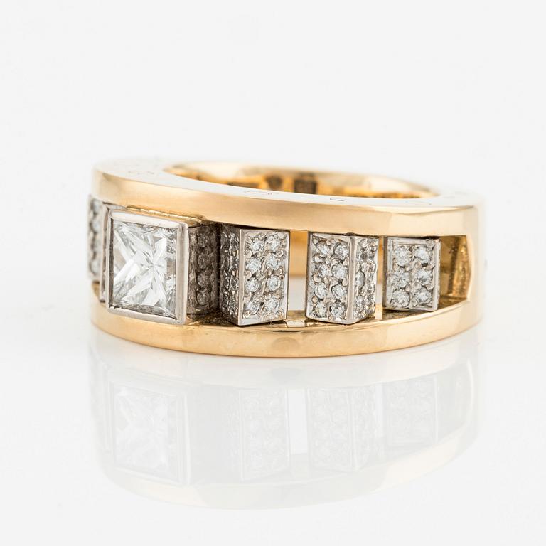 An 18K gold Gaudy ring with a princess-cut diamond.
