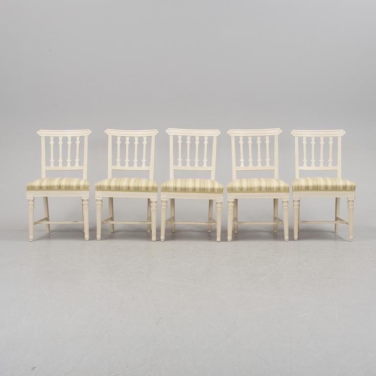 A set of five early 1800s chairs.