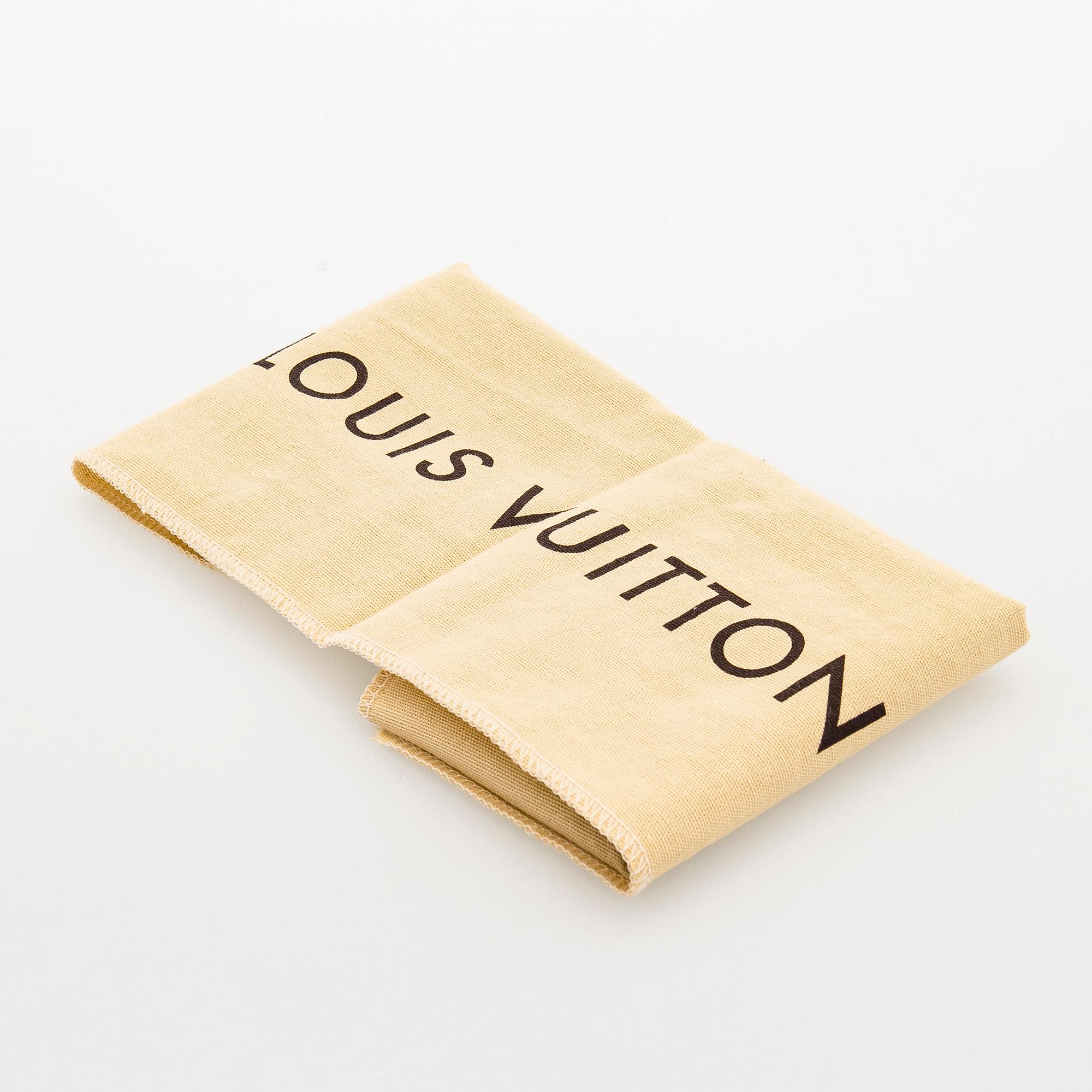 Louis Vuitton, a 'Selenga' clutch bag.