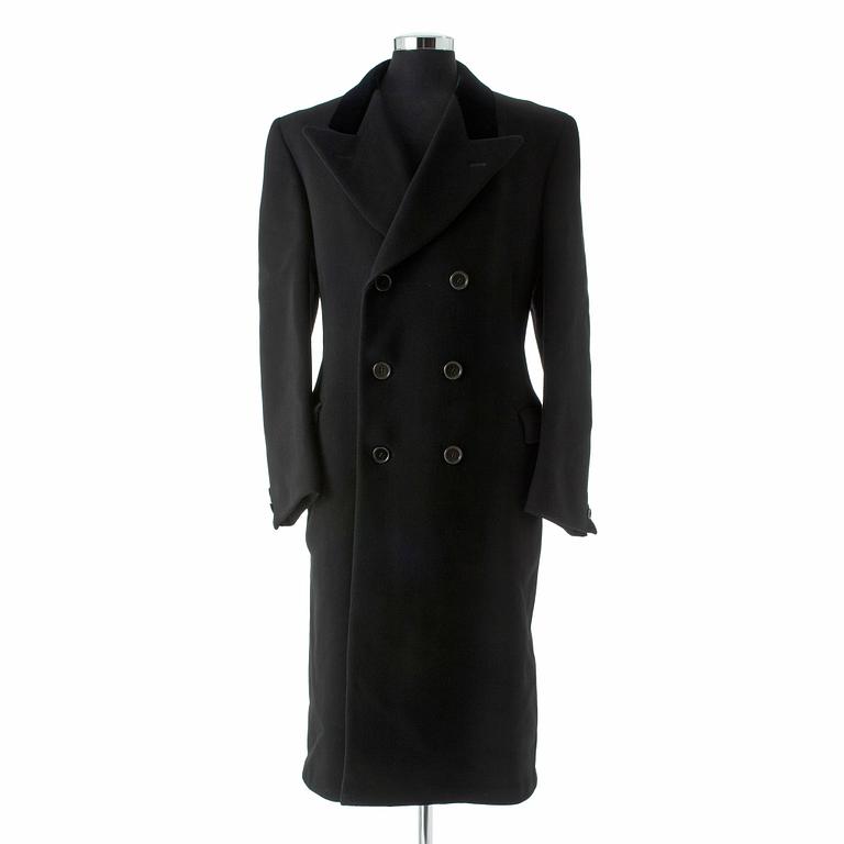 ELIT, a black wool overcoat.