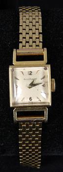 DAMARMBANDSUR, 18K guld. Urverk Jaeger Le Coultre. 26 gram.