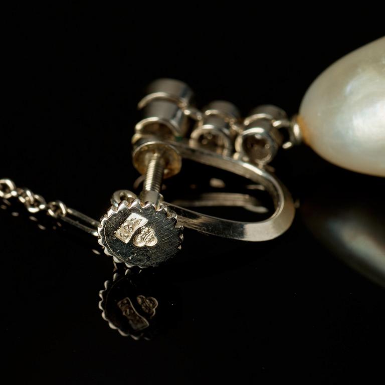 A pair of natural drop-shaped saltwater pearl and old-cut diamond earrings. Length of pearls circa 14 - 14.5 mm.