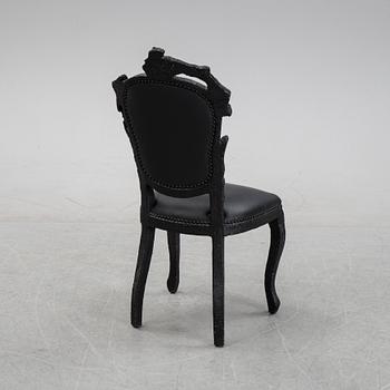 Maarten Baas, a promotional "Smoke dining chair" for Moooi,  after 2002.