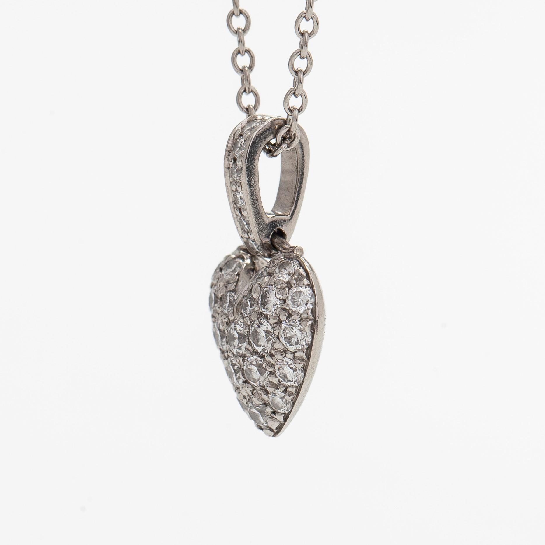 Tiffany & Co, a platinum necklace with a pendant in the shape of a heart, with diamonds totalling approximately 0.27 ct.