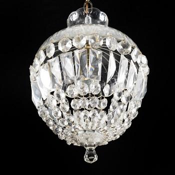 A one-light ceiling lamp, mid 1900s.