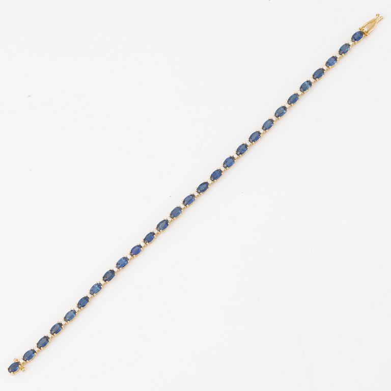 Bracelet 18K gold with oval-cut sapphires and brilliant-cut diamonds.