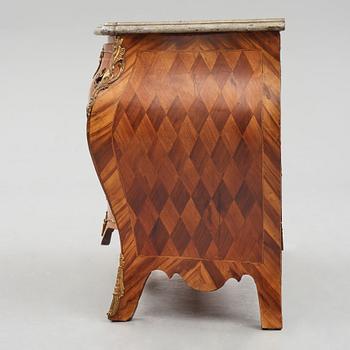 A rococo rosewood-veneered and ormolu-mounted commode by N. Korp (master 1763-1800).