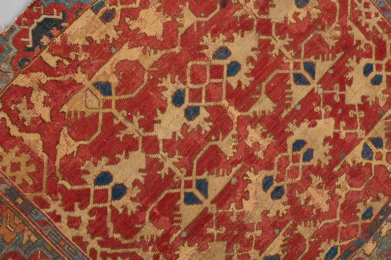 A CARPET FRAGMENT, an antique Western Anatolian "Lotto", 17th century, ca 105 x 125 cm.