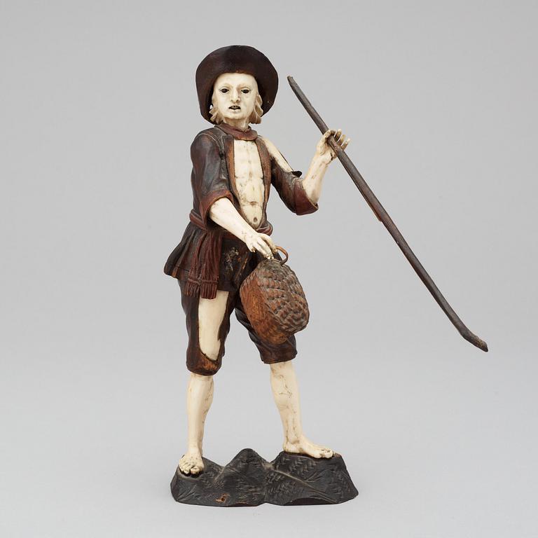 A German 18th century figurine in Simon Trogers manner.