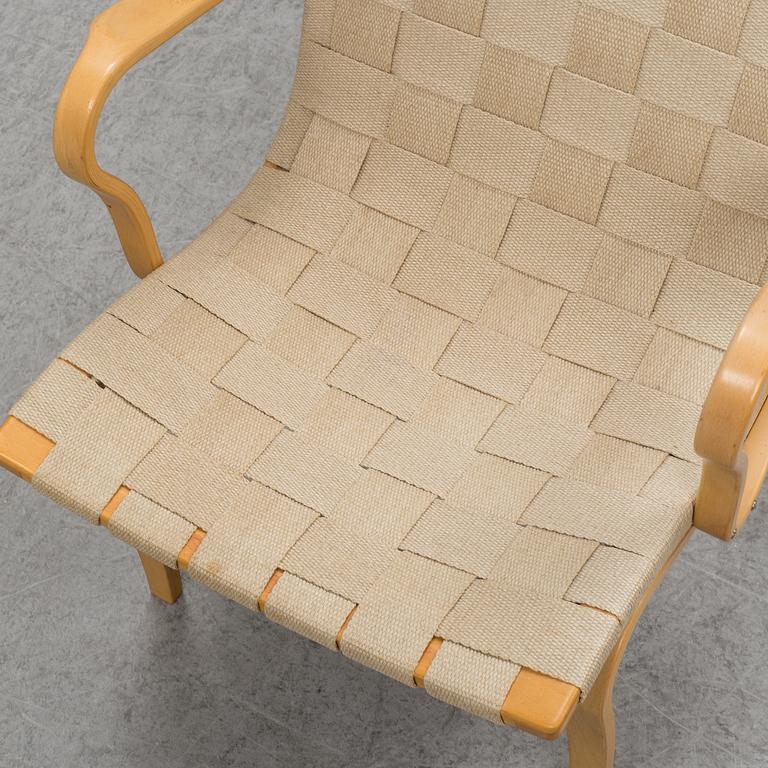 An 'Eva' easy chair by Bruno Mathsson for Dux.