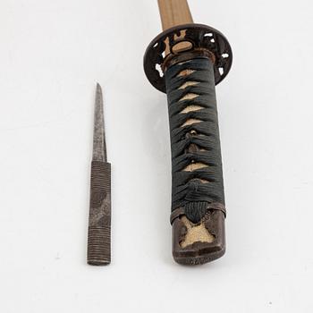 Wakizashi, mumei, from Japan in shirasaya with koshirae.