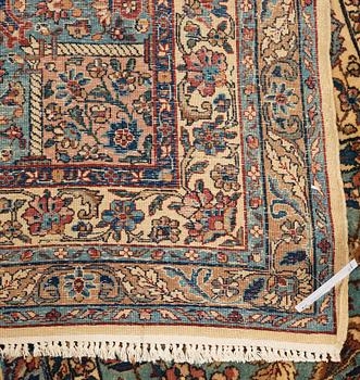 A CARPET. An old Kerman. 521 x 356 cm.