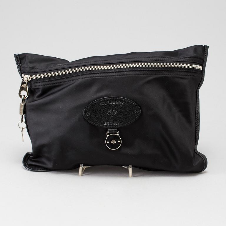 A foldable Mulberry weekend bag.