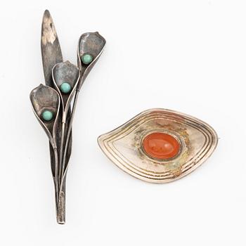 Two brooches, sterling silver with stones, Michelsen, Stockholm 1952 and Per Sköld, Stockholm 1952.