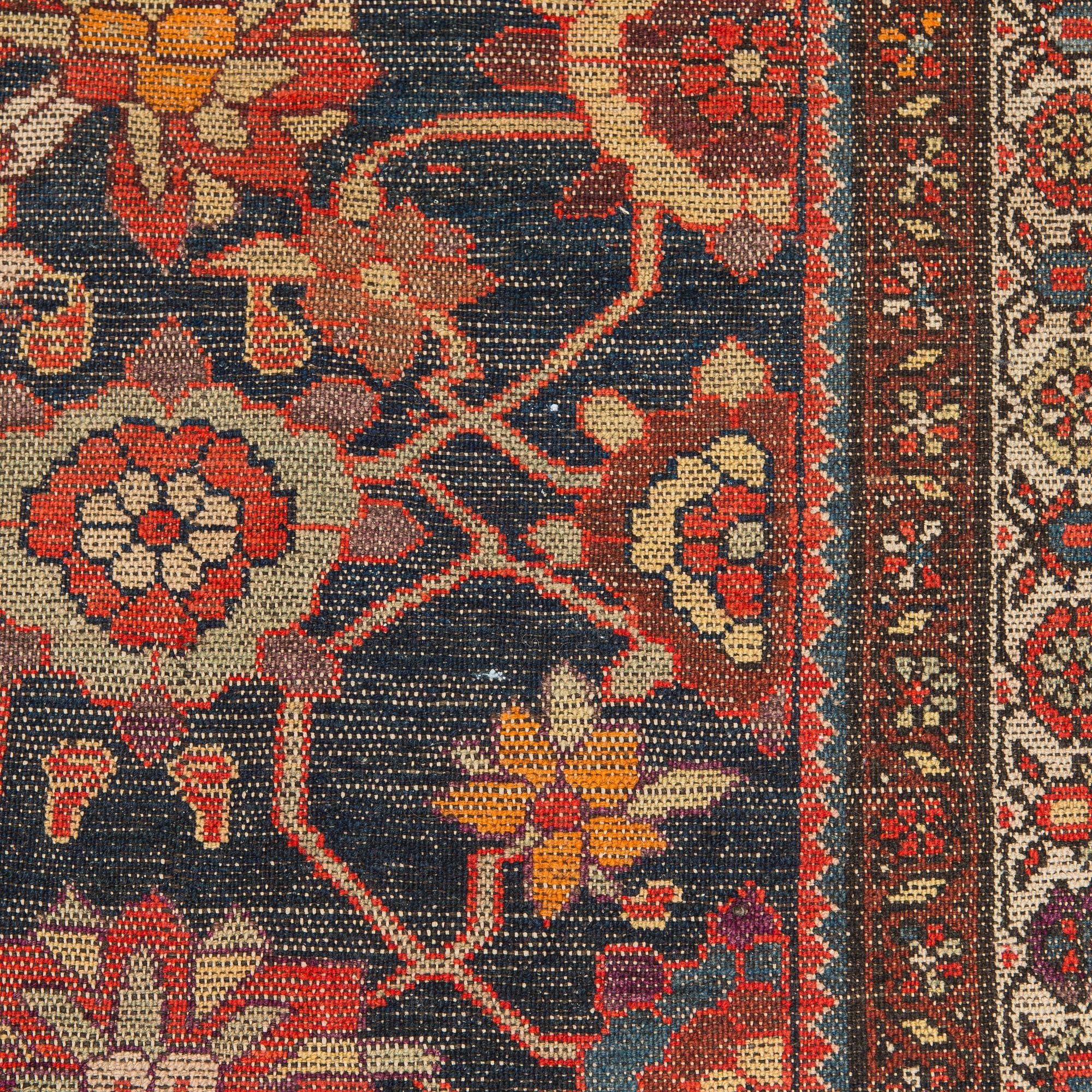 A Hamadan rug of 'Mina Khani design'. Circa 197 x 131 cm.