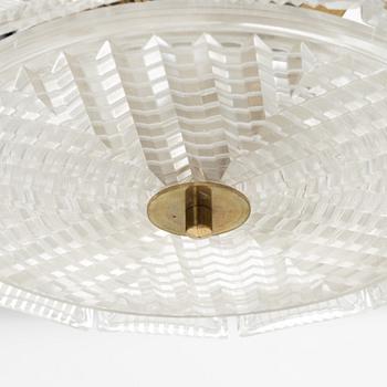 Carl Fagerlund, a pair of brass and glass ceiling lights, Orrefors.