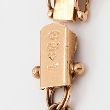 A 14K gold Bismarck necklace and bracelet.