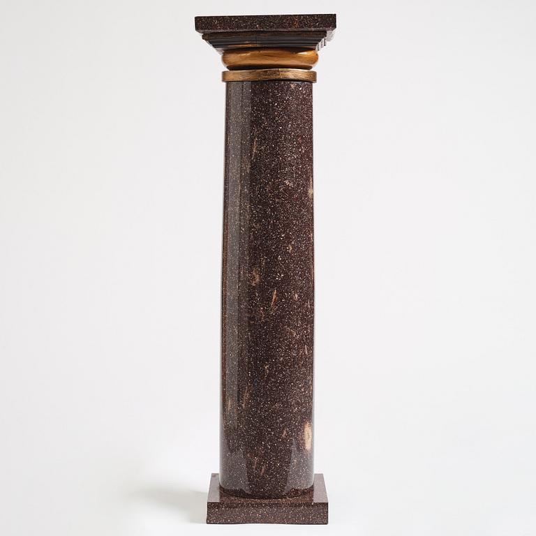 A Swedish porphyry column, 19th century.